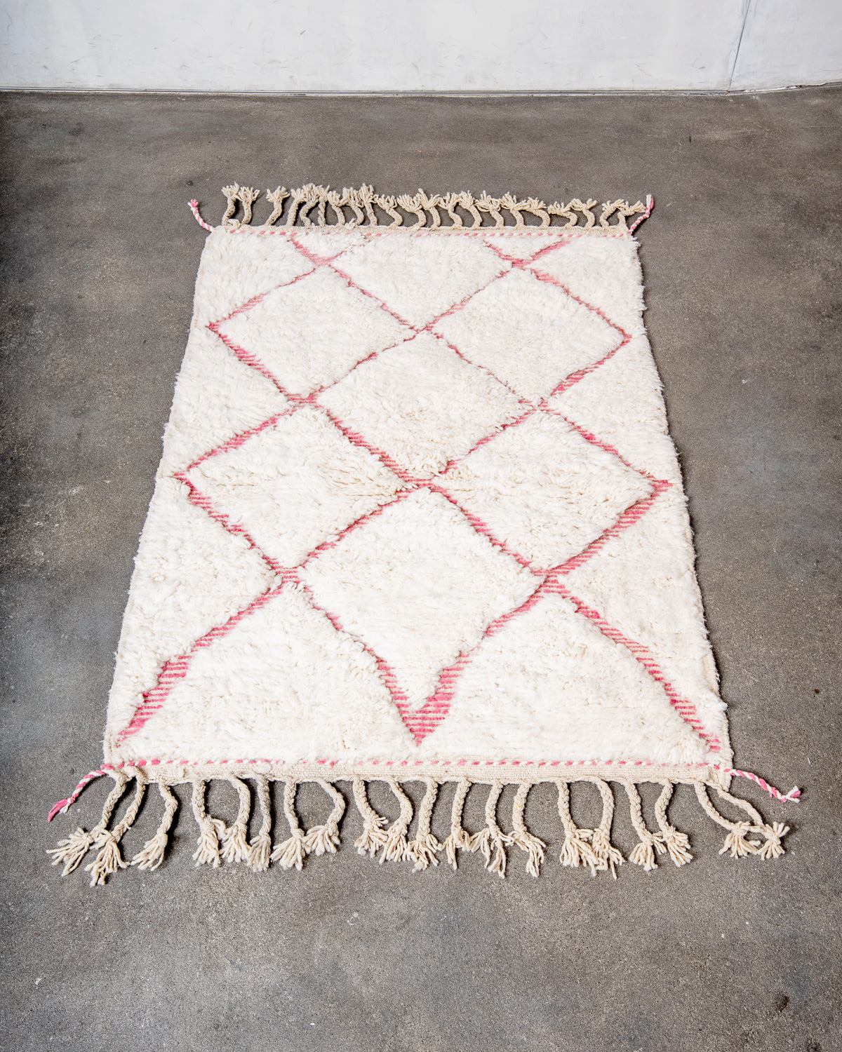 Modern, designer, handcrafted Berber rug from Morocco. Beniourain carpet with beautiful colours and patterns and fluffy wool texture.